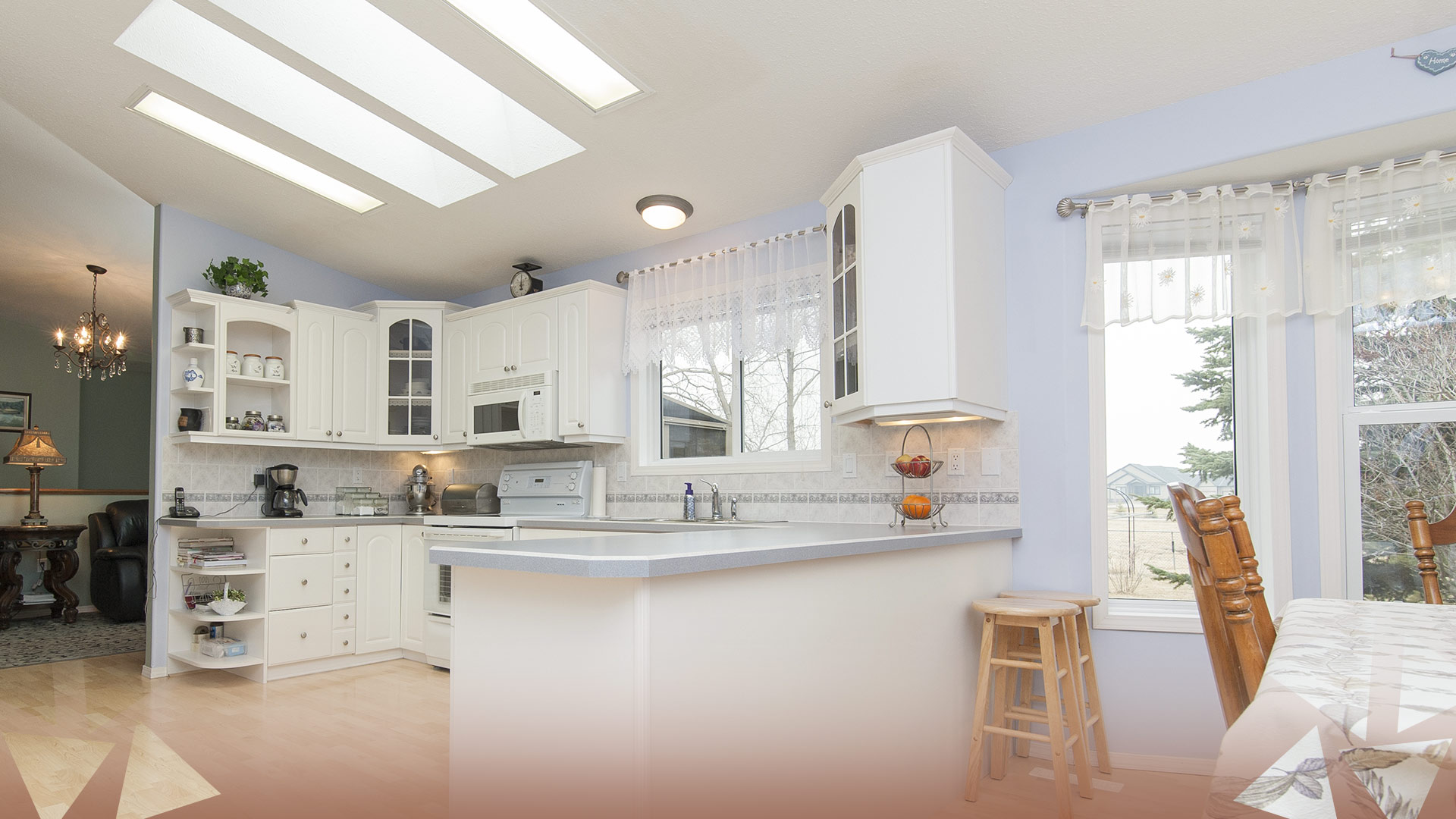 L-Shaped Kitchen Design with a Breakfast Counter