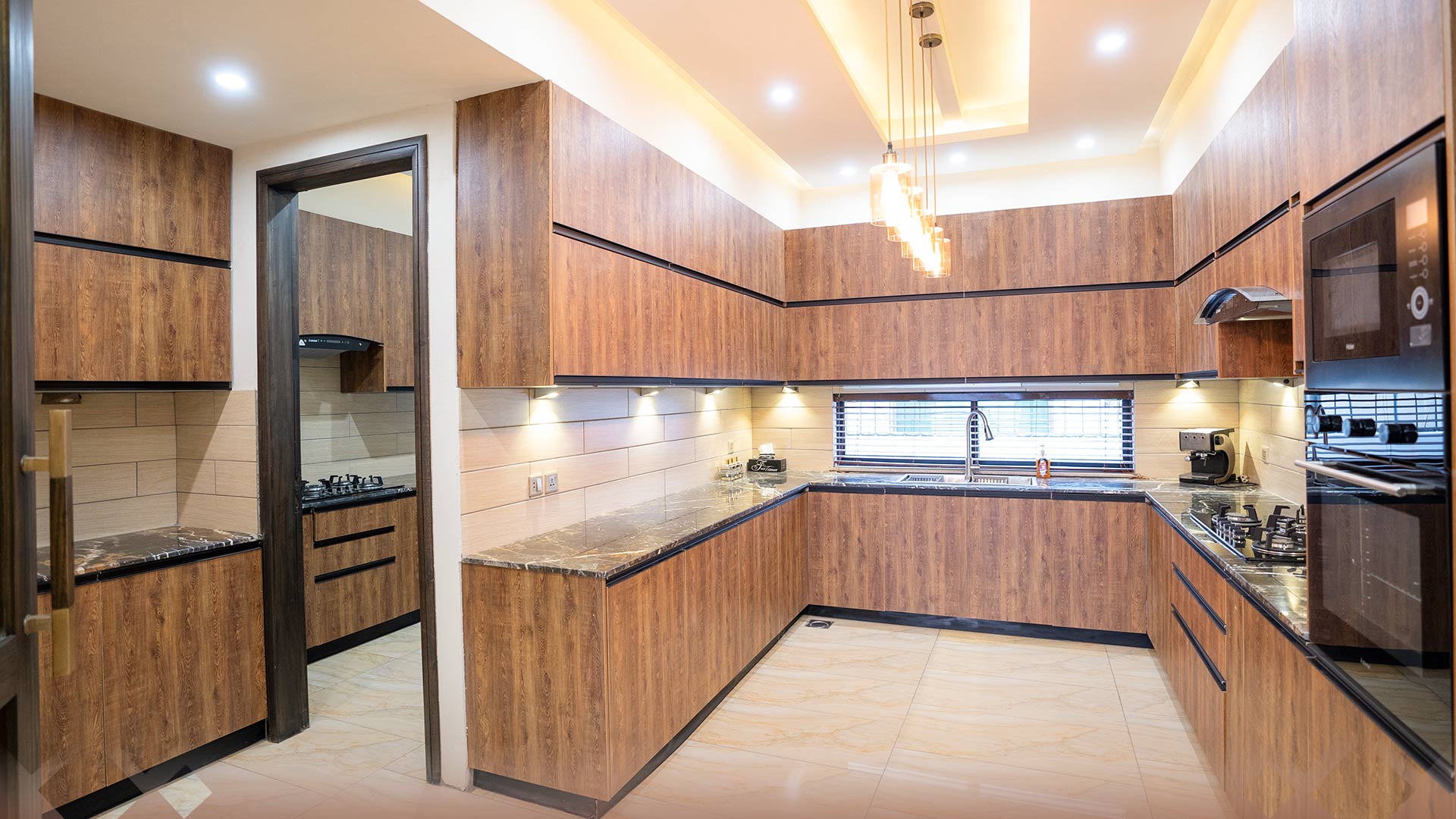 U-Shaped Modular Kitchen Design With Wooden Finish